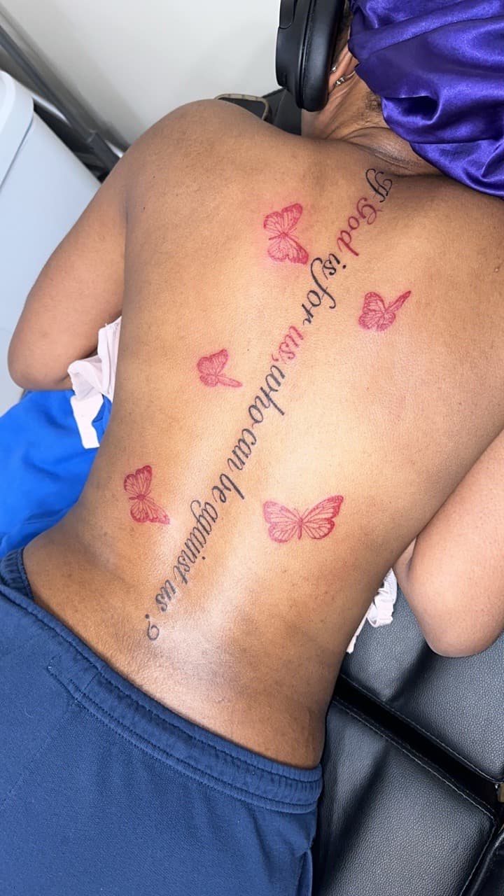 Lettering + Script butterflies tattoo on Spine by Jamarious_Cook on TattMe
