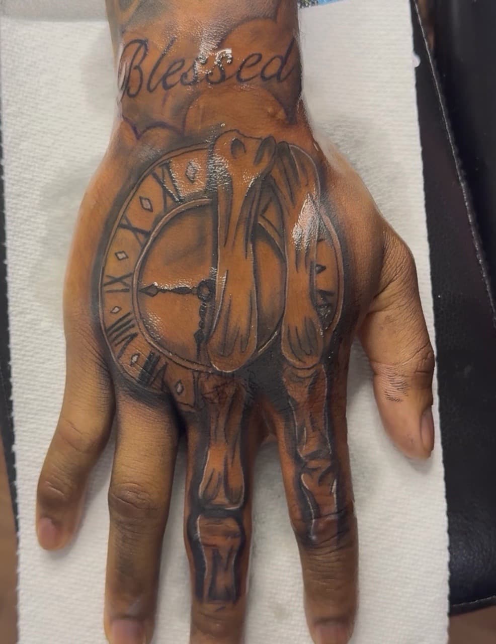 Black & Grey + Lettering clock tattoo on Hand by Speedytattoos on TattMe