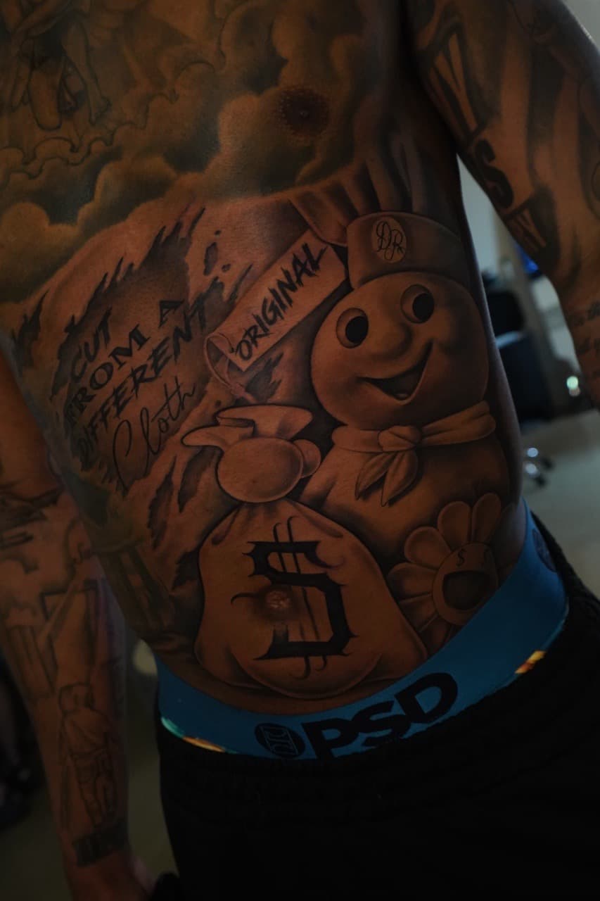 Black & Grey + Cartoon cartoon character tattoo on Ribs by 16thRich on TattMe