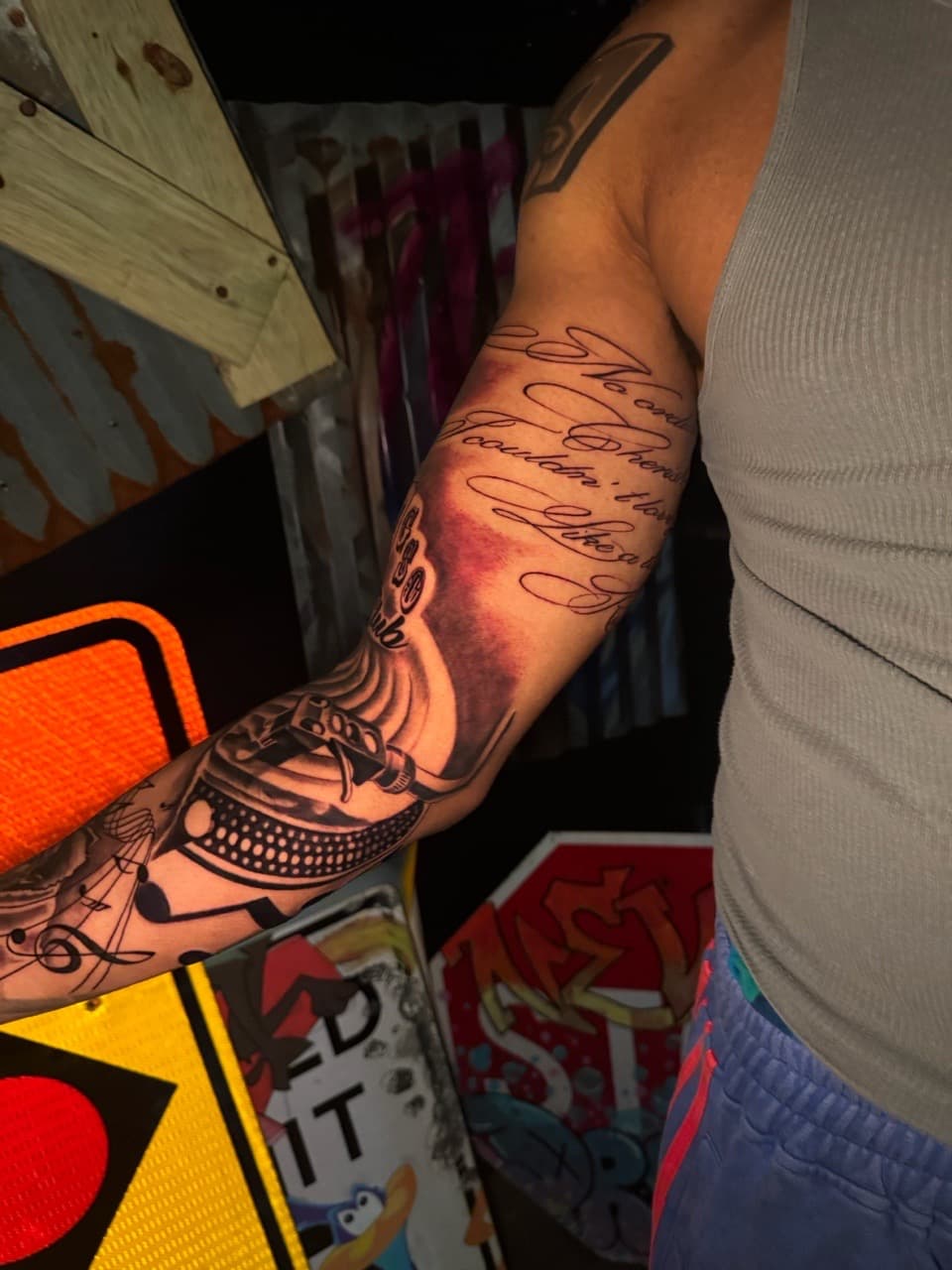 Black & Grey + Script turntable tattoo on Half Sleeve by Inkheadz on TattMe