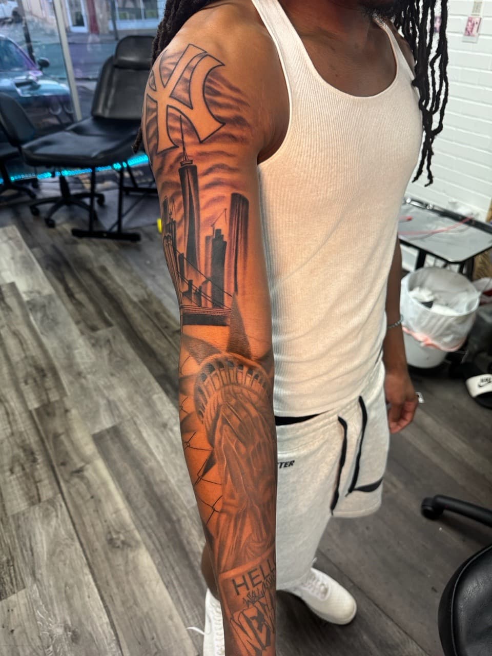 Black & Grey + Illustrative Realism new york tattoo on Full Sleeve by Inkheadz on TattMe