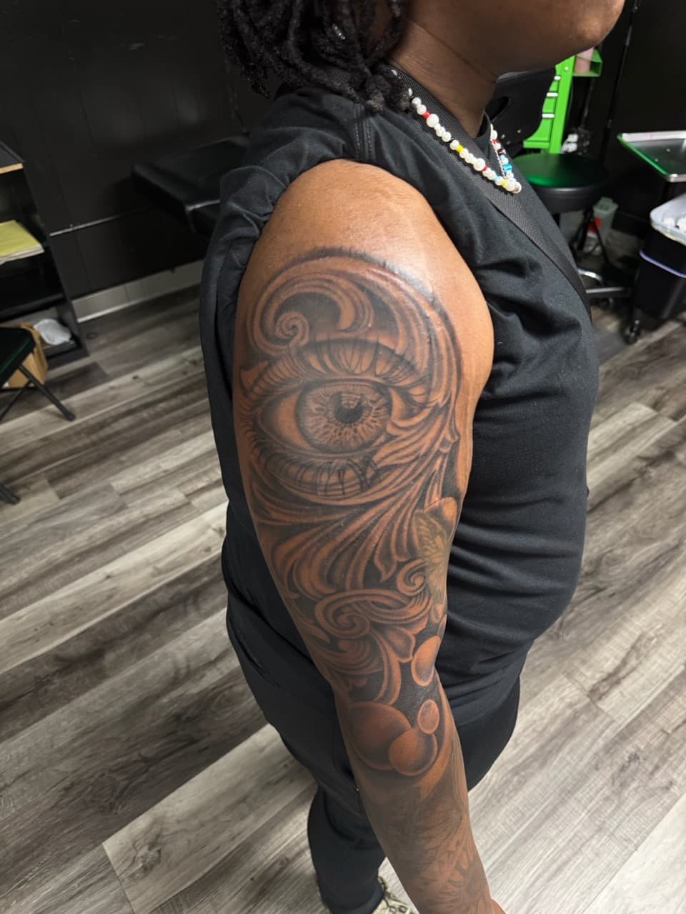 Black & Grey + Illustrative eye tattoo on Half Sleeve by Inkheadz on TattMe