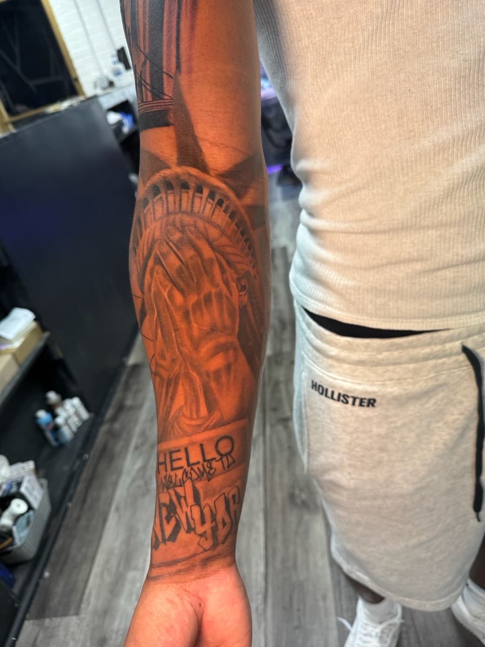 Black & Grey + Realism statue of liberty tattoo on Forearm by Inkheadz on TattMe