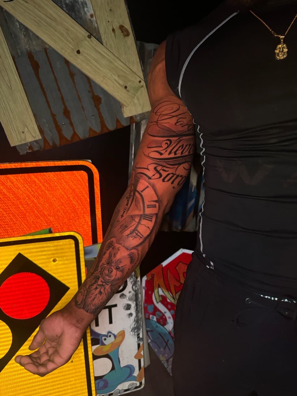 Black & Grey + Lettering teddy bear tattoo on Half Sleeve by Inkheadz on TattMe