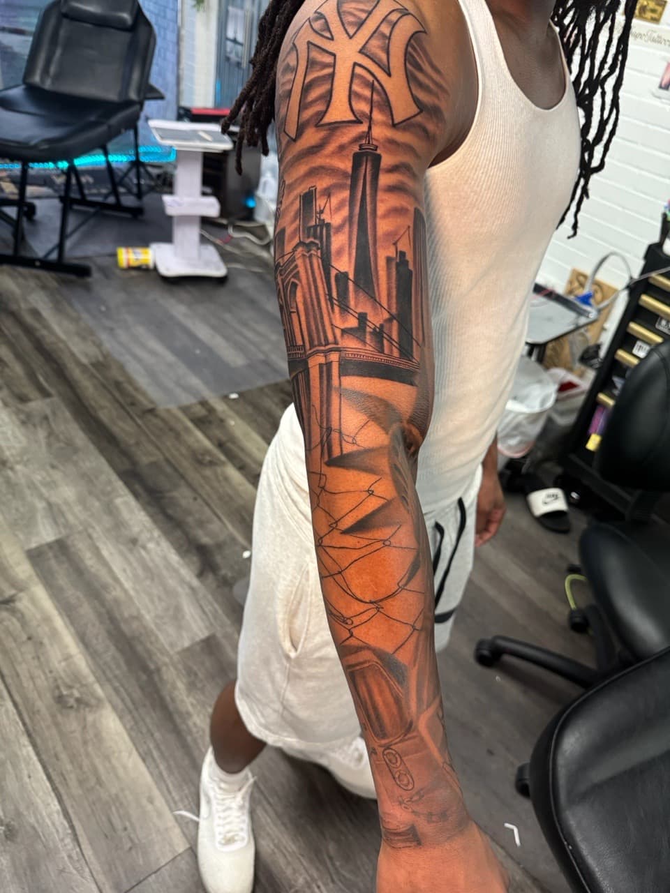 Black & Grey + Illustrative new york yankees tattoo on Full Sleeve by Inkheadz on TattMe