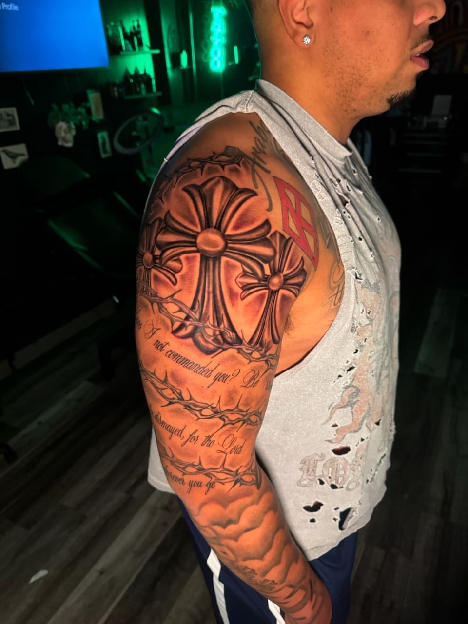 Black & Grey + Lettering crosses tattoo on Half Sleeve by Inkheadz on TattMe