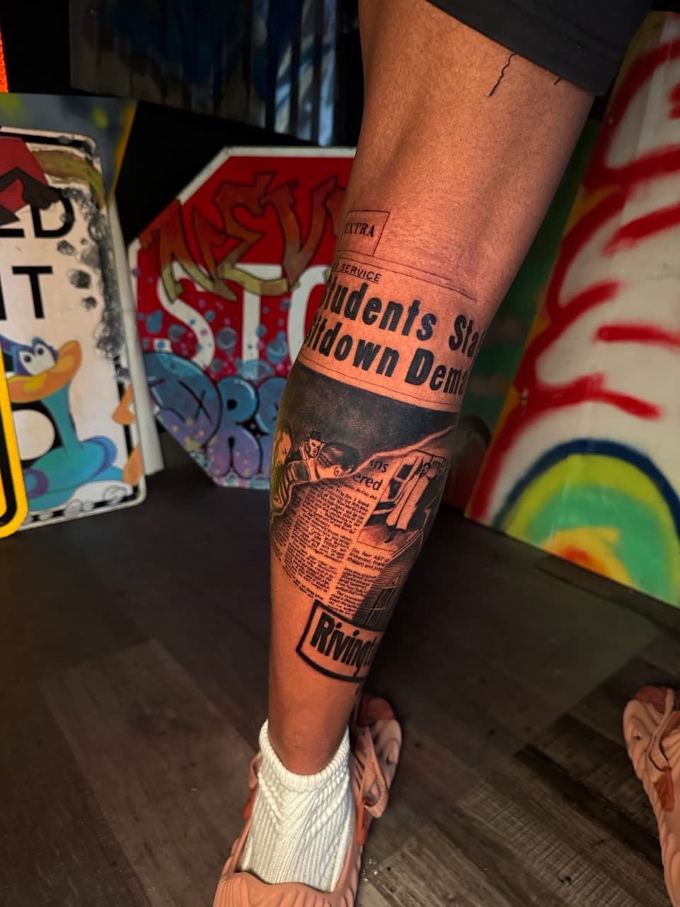 Black & Grey + Lettering newspaper tattoo on Calf by Inkheadz on TattMe