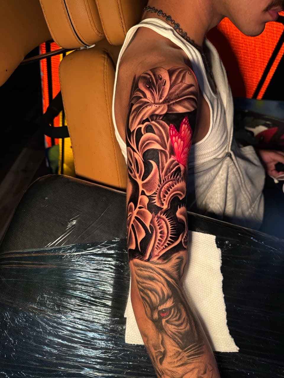 Black & Grey + Color lily tattoo on Full Sleeve by Inkheadz on TattMe