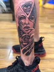 Black & Grey + Realism woman tattoo on Calf by Chris on TattMe