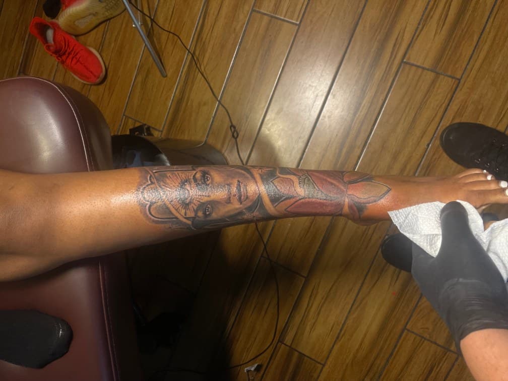 Realism + Black & Grey woman tattoo on Shin by Chris on TattMe