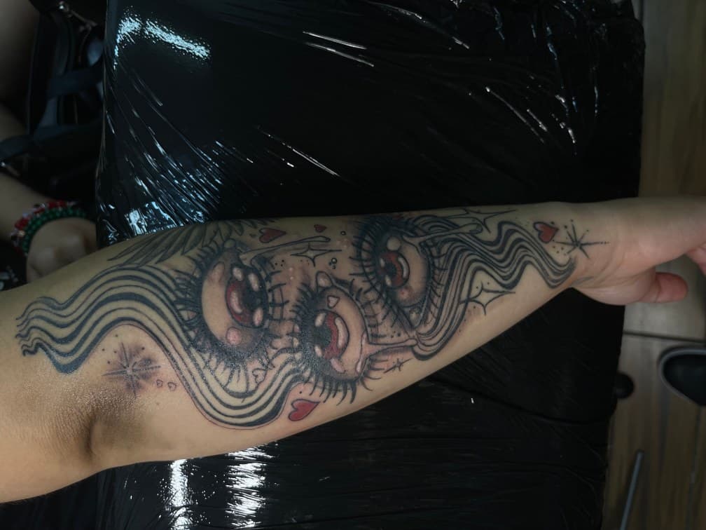 Illustrative + Black & Grey eyes tattoo on Forearm by Chris on TattMe