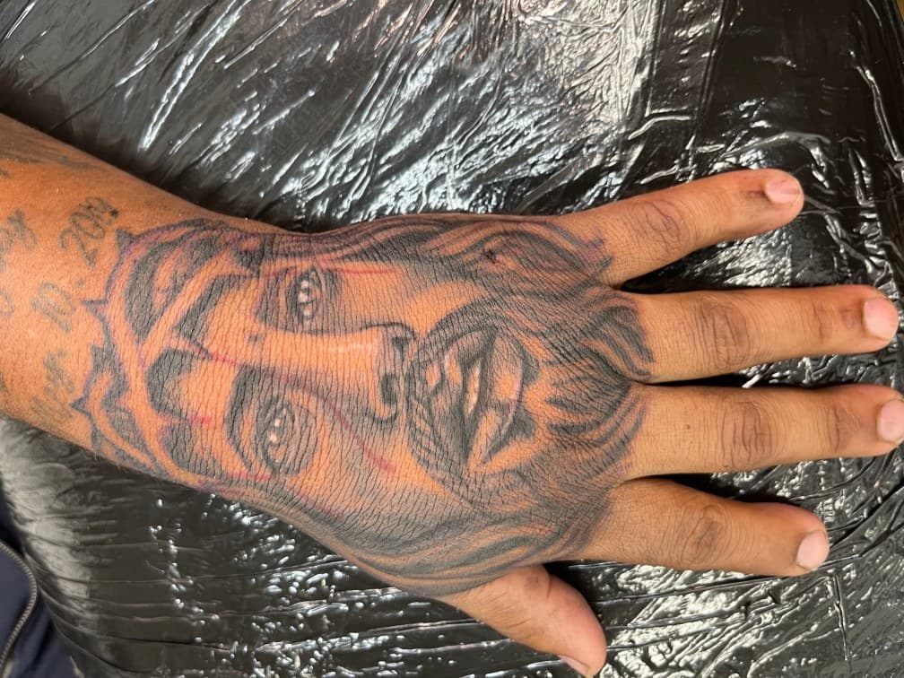 Realism + Black & Grey jesus tattoo on Hand by Chris on TattMe