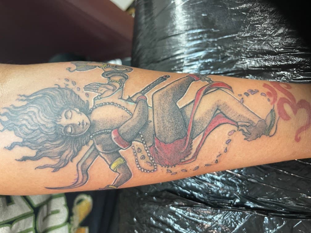 Illustrative + Color deity tattoo on Forearm by Chris on TattMe