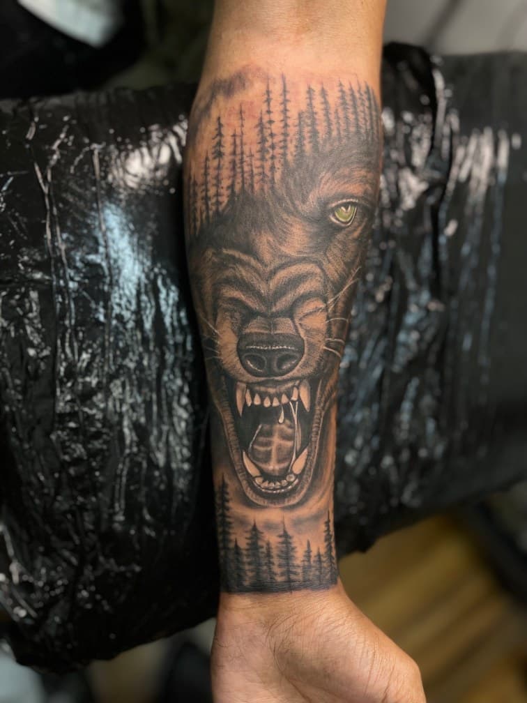 Realism + Black & Grey wolf tattoo on Forearm by Chris on TattMe