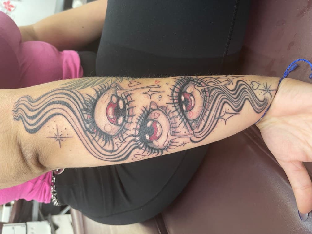 Illustrative + Cartoon eyes tattoo on Forearm by Chris on TattMe