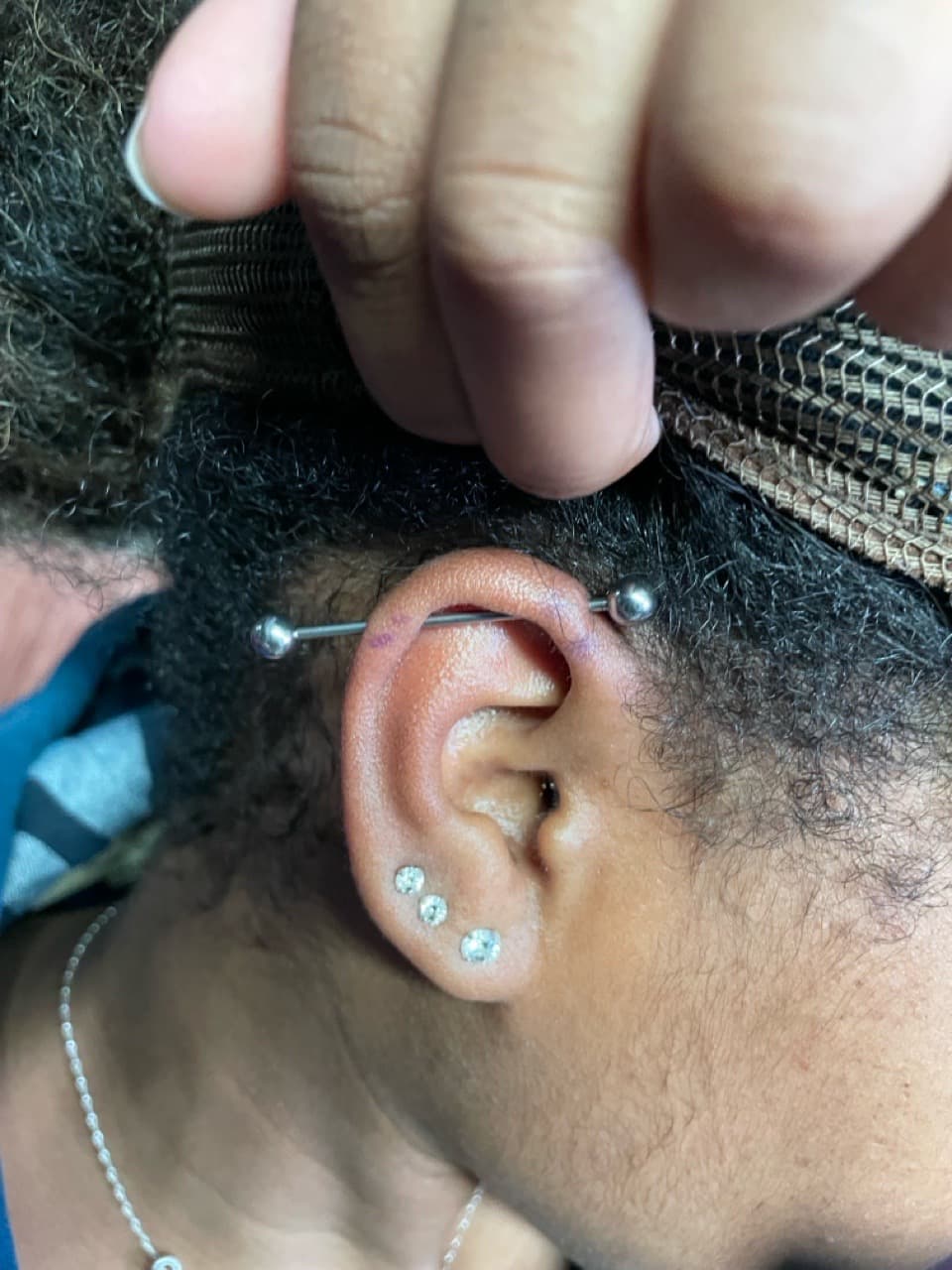 ear tattoo on Face by Ariesinkedme on TattMe