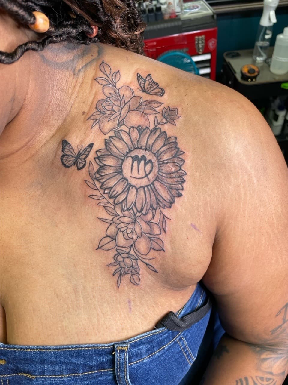 Floral + Line-work sunflower tattoo on Ribs by Ariesinkedme on TattMe