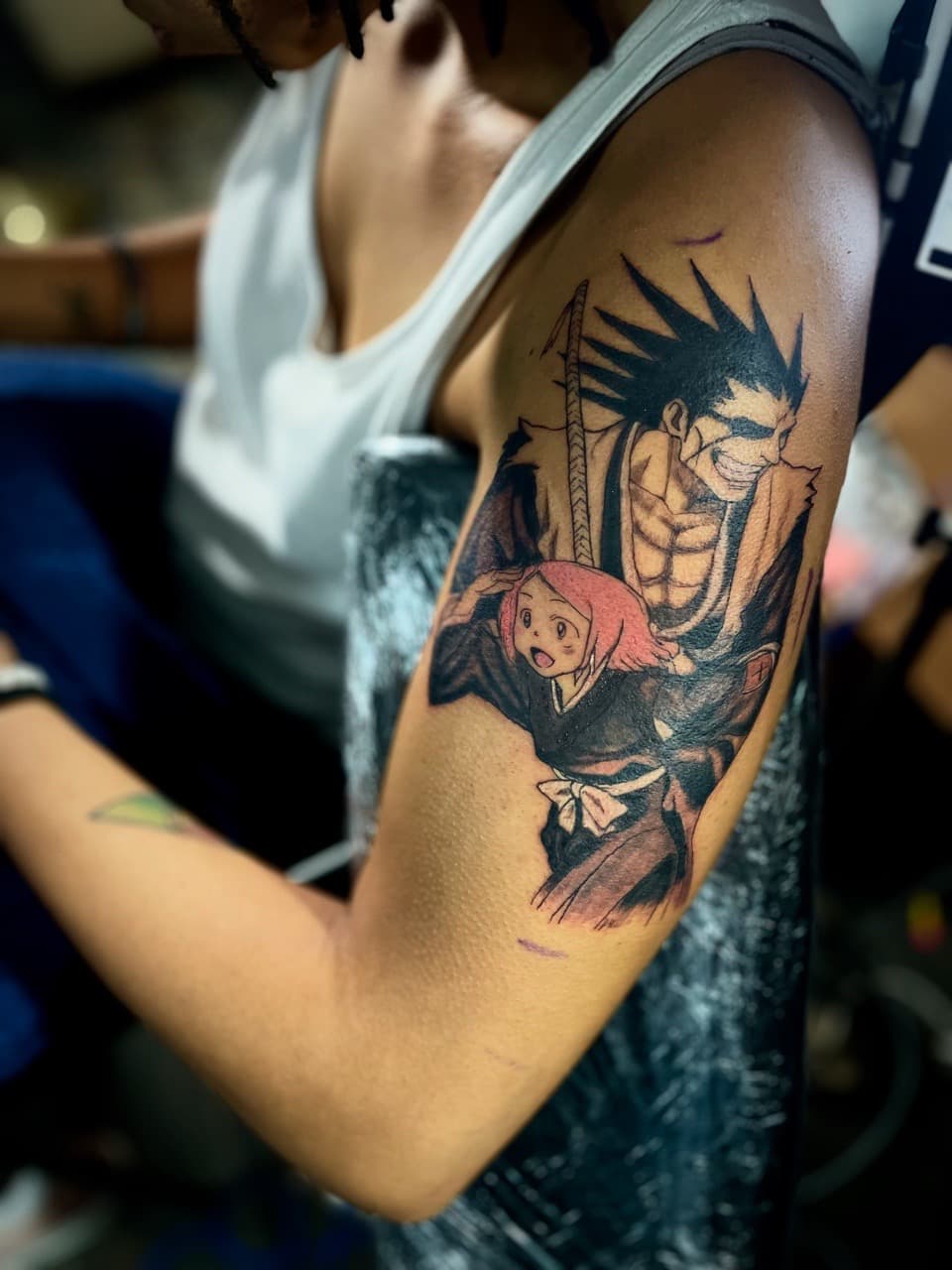 Anime + Illustrative characters tattoo on Upper Arm by Ariesinkedme on TattMe