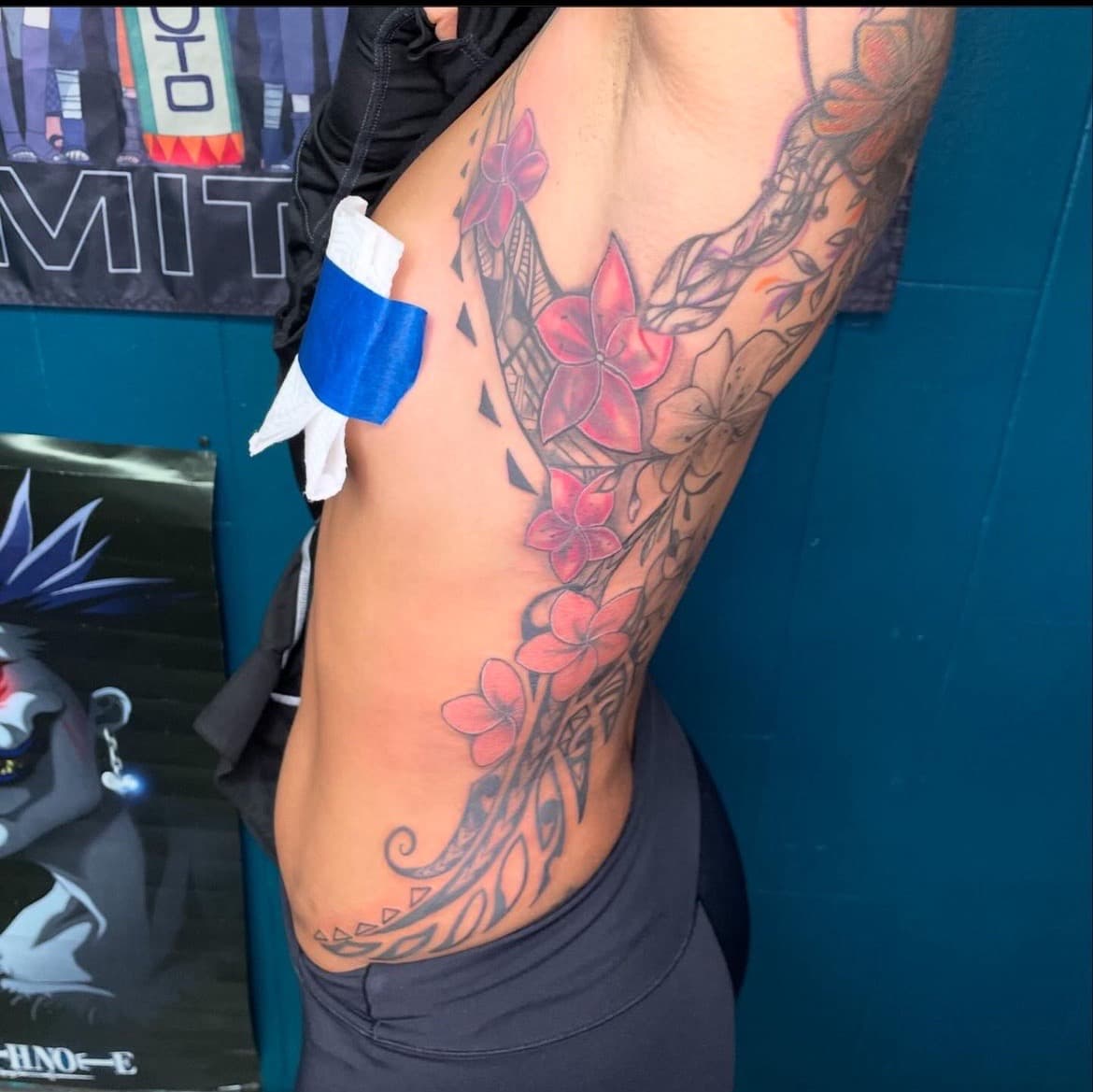 Floral + Color flowers tattoo on Side (Torso) by Ariesinkedme on TattMe