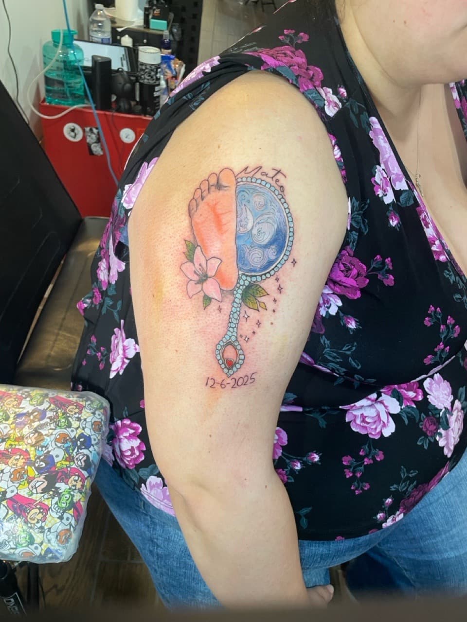 Color + Illustrative baby foot tattoo on Upper Arm by Ariesinkedme on TattMe