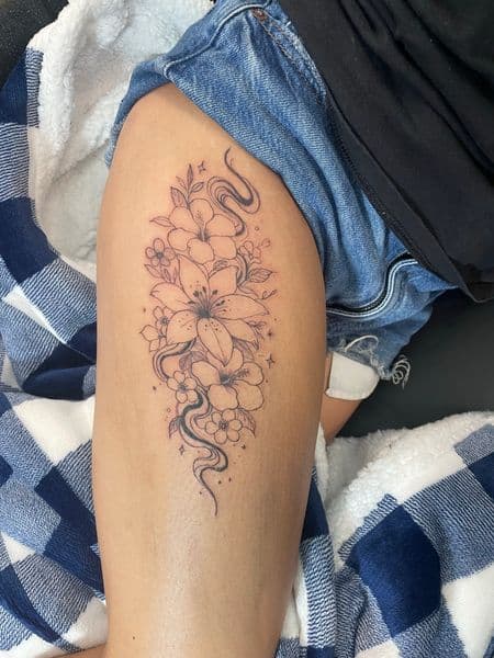 Fine Line + Floral flowers tattoo on Thigh by Ariesinkedme on TattMe