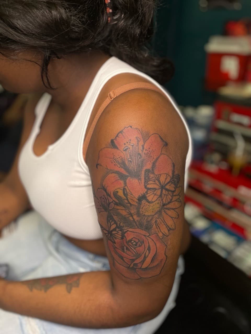 Floral + Color flowers tattoo on Upper Arm by Ariesinkedme on TattMe