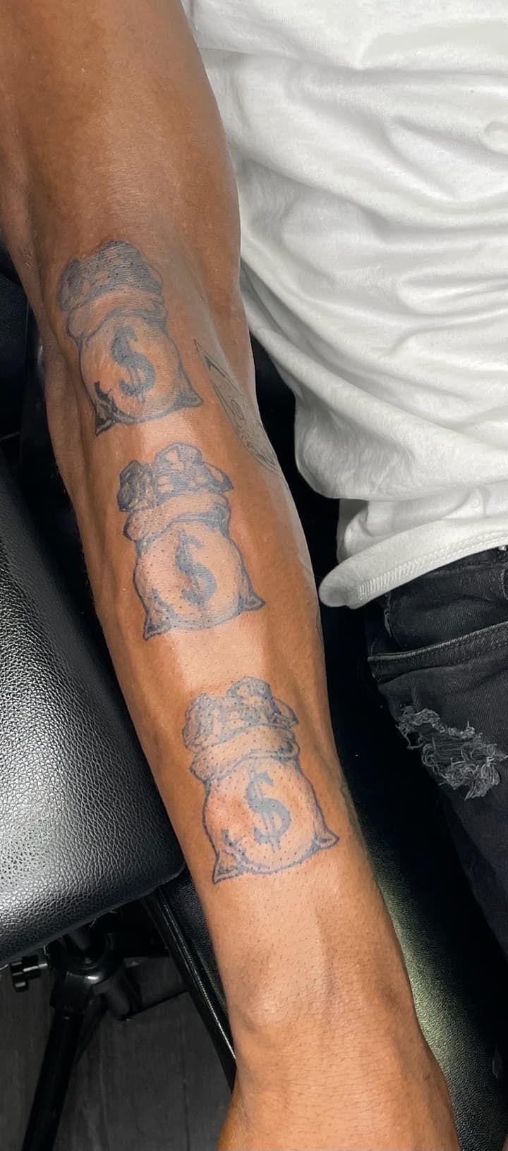 Black & Grey + Illustrative money bags tattoo on Forearm by Ariesinkedme on TattMe