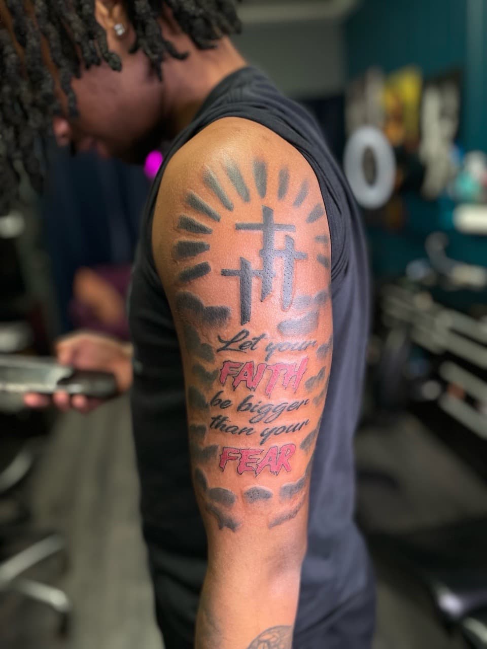 Lettering + Black & Grey crosses tattoo on Upper Arm by Ariesinkedme on TattMe