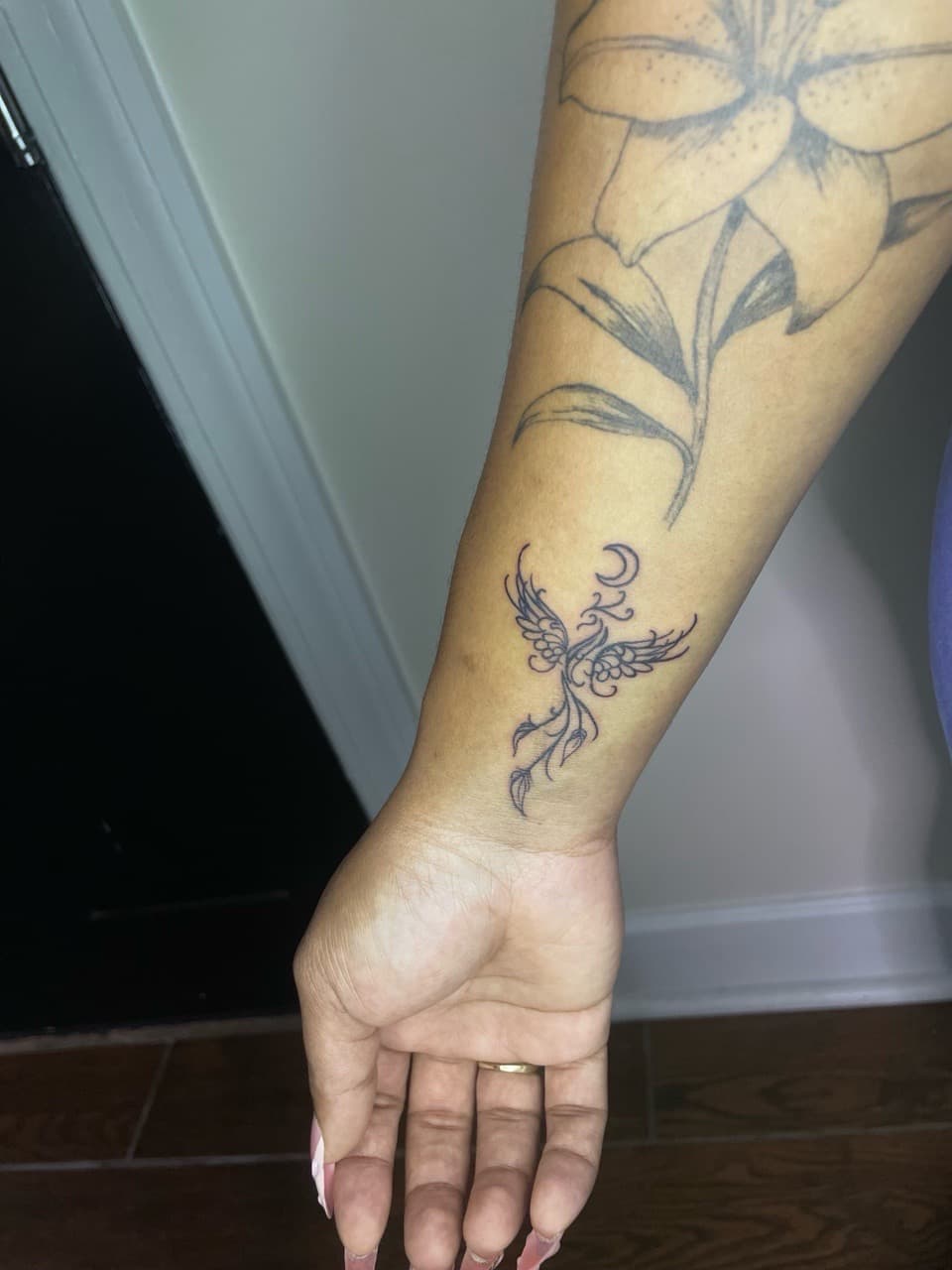 Fine Line + Line-work phoenix tattoo on Wrist by Ariesinkedme on TattMe