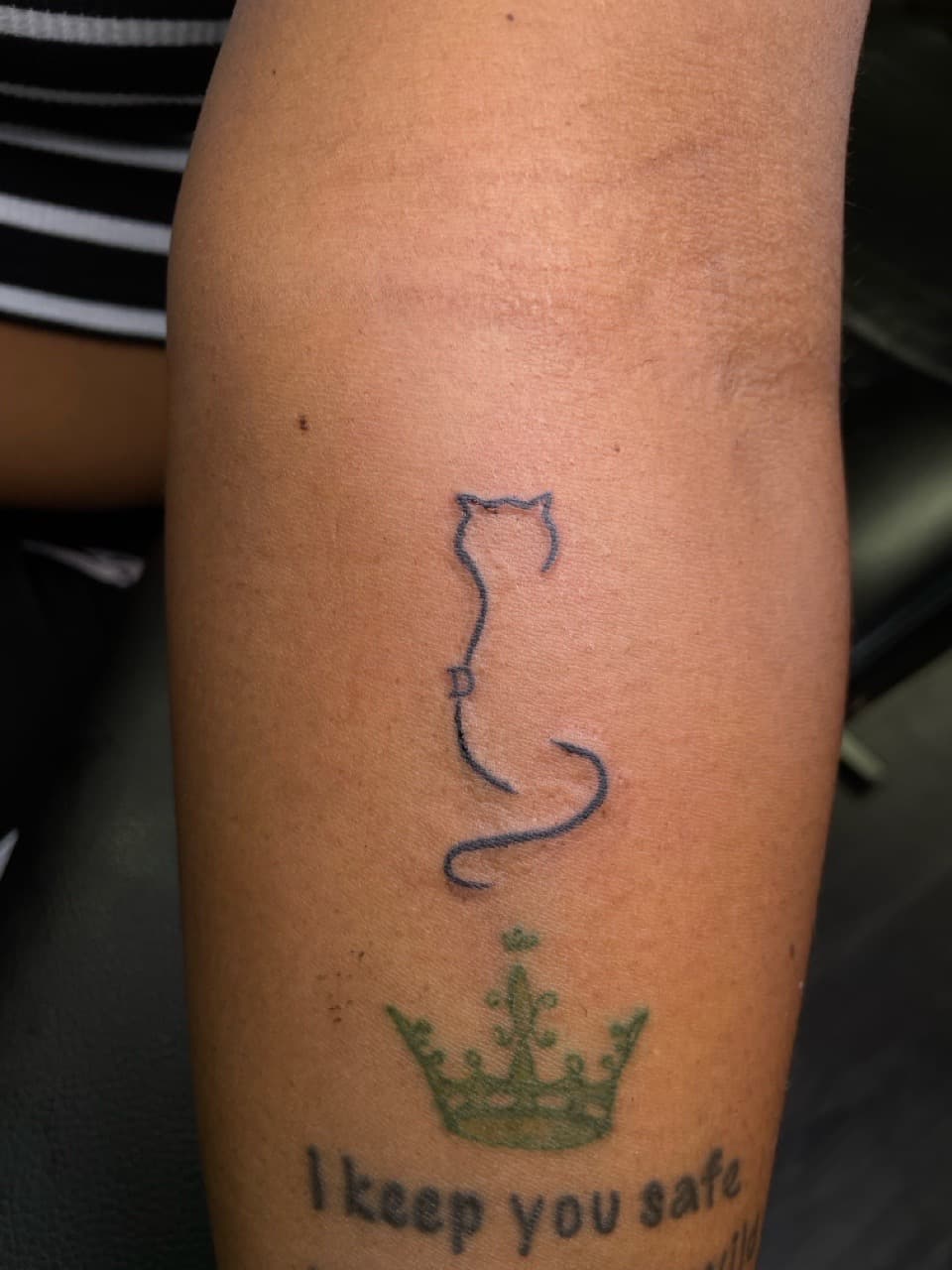 Fine Line + Minimalist cat tattoo on Upper Arm by Ariesinkedme on TattMe