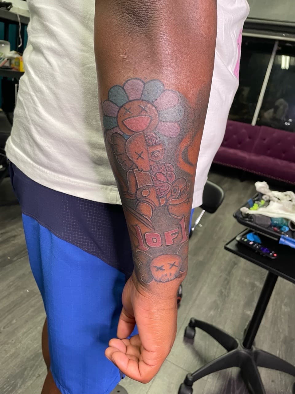 Pop Culture + Cartoon kaws tattoo on Forearm by Ariesinkedme on TattMe