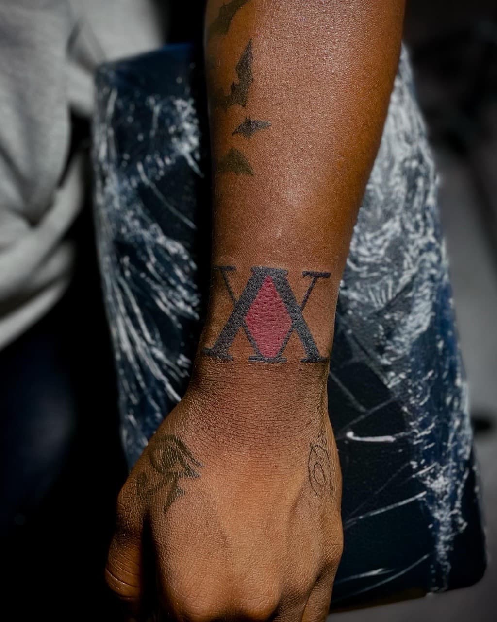 Color + Illustrative logo tattoo on Forearm by Ariesinkedme on TattMe