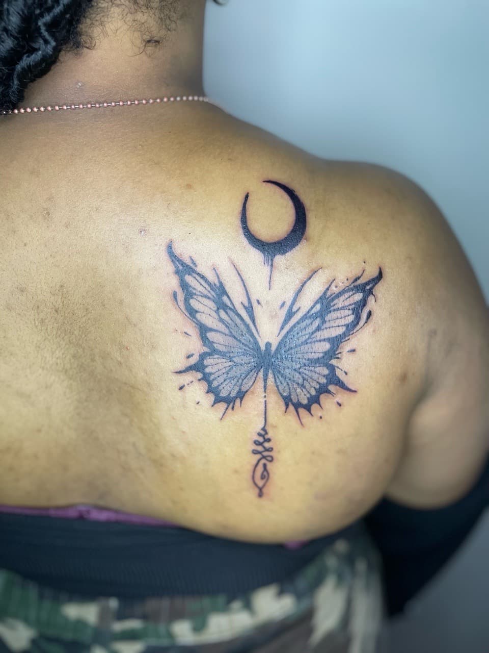 Fine Line + Black-work butterfly tattoo on Upper Back by Ariesinkedme on TattMe
