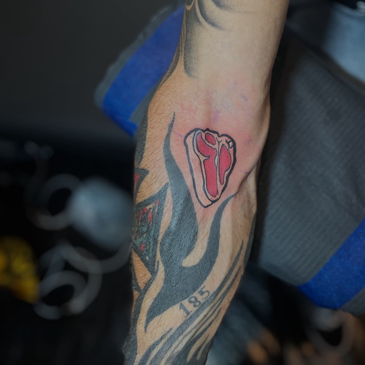 New School + Cartoon steak tattoo on Forearm by Ariesinkedme on TattMe