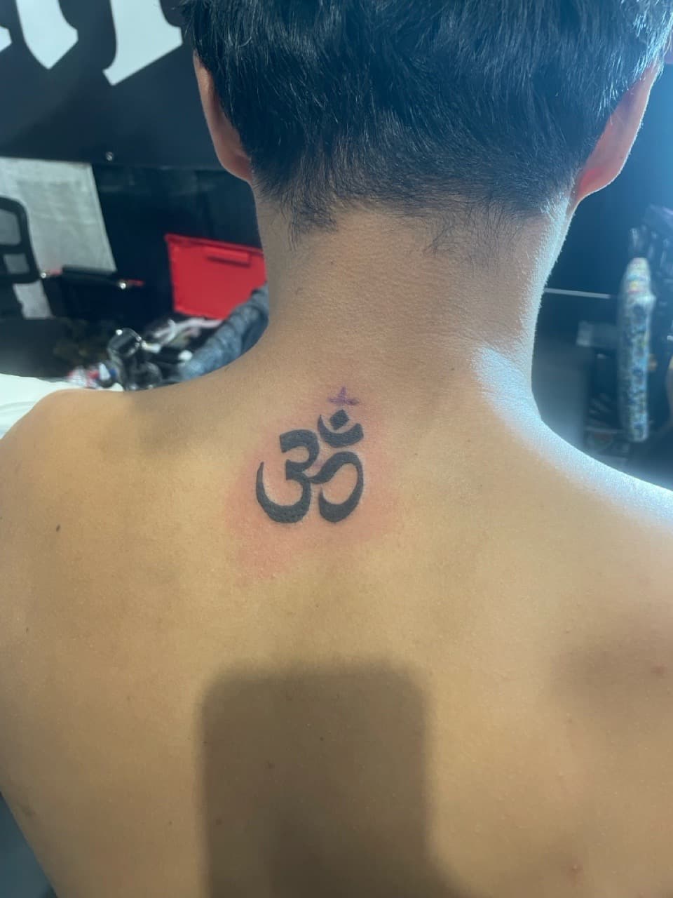 Black-work + Minimalist om symbol tattoo on Neck (Side) by Ariesinkedme on TattMe