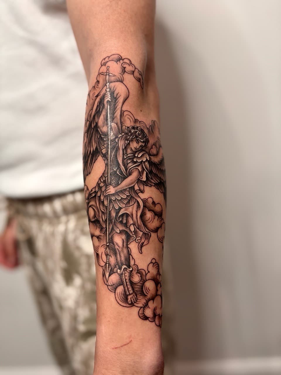 Black & Grey + Illustrative angel tattoo on Forearm by Damionjonestattoos on TattMe