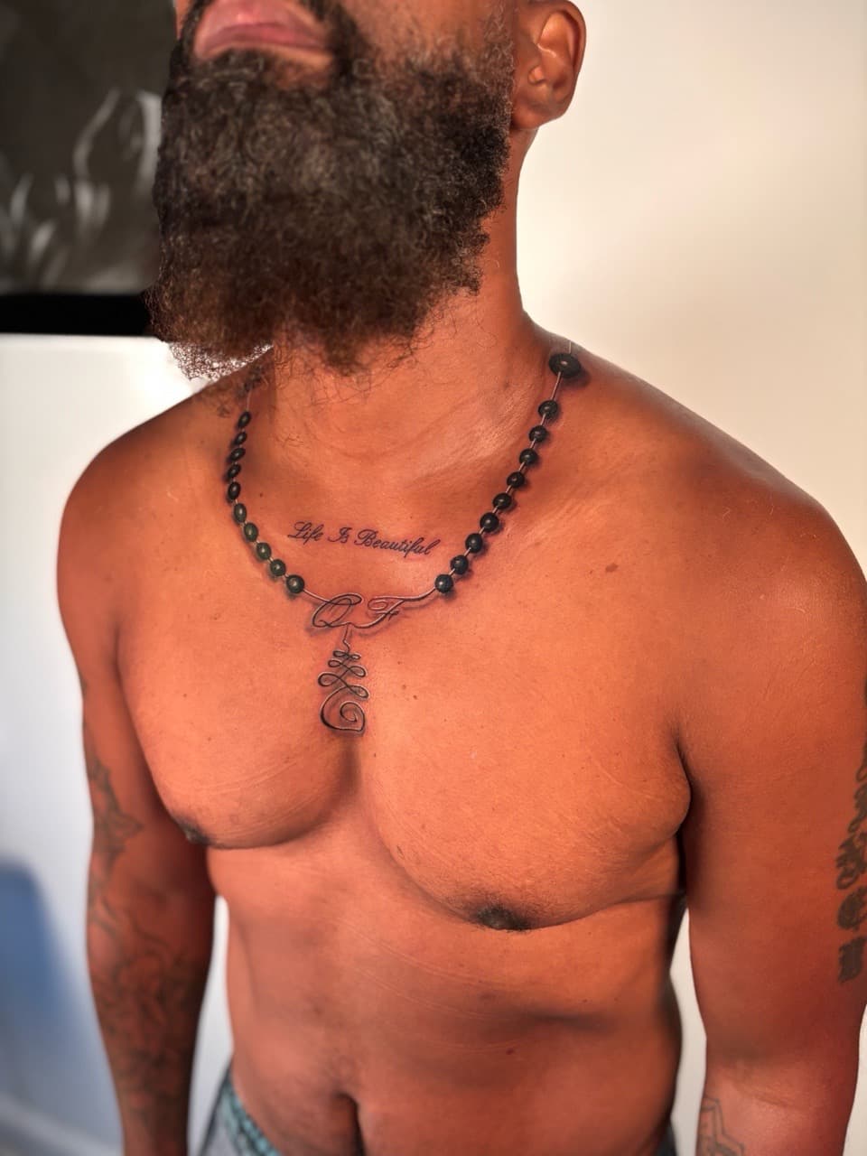 Fine Line + Black & Grey necklace tattoo on Chest by Damionjonestattoos on TattMe