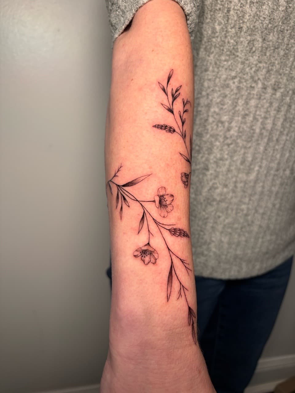 Fine Line + Floral flowers tattoo on Forearm by Damionjonestattoos on TattMe