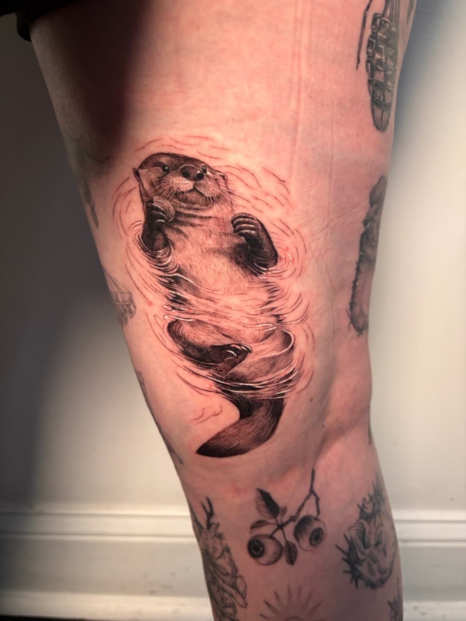 Black & Grey + Illustrative otter tattoo on Thigh by Damionjonestattoos on TattMe