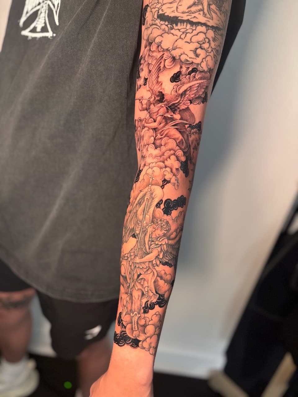 Black & Grey + Illustrative angels tattoo on Full Sleeve by Damionjonestattoos on TattMe