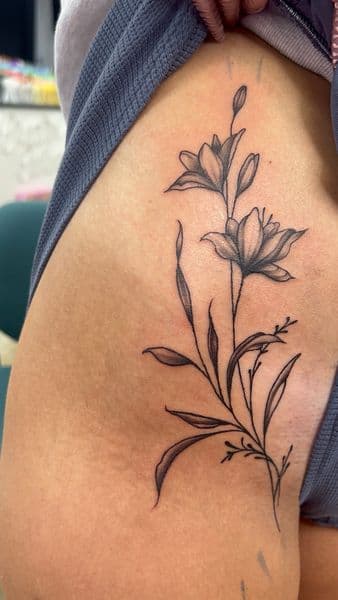 Fine Line + Black & Grey lilies tattoo on Groin by TonyCreativeCultureTattoo on TattMe