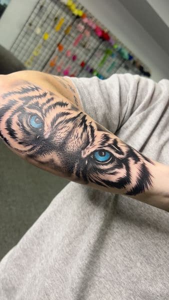 Realism + Black & Grey tiger tattoo on Forearm by TonyCreativeCultureTattoo on TattMe
