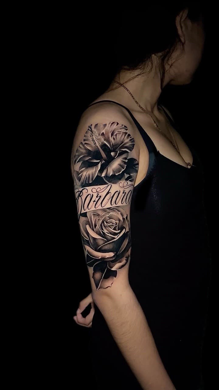 Black & Grey + Floral hibiscus tattoo on Upper Arm by Santos_inkz on TattMe