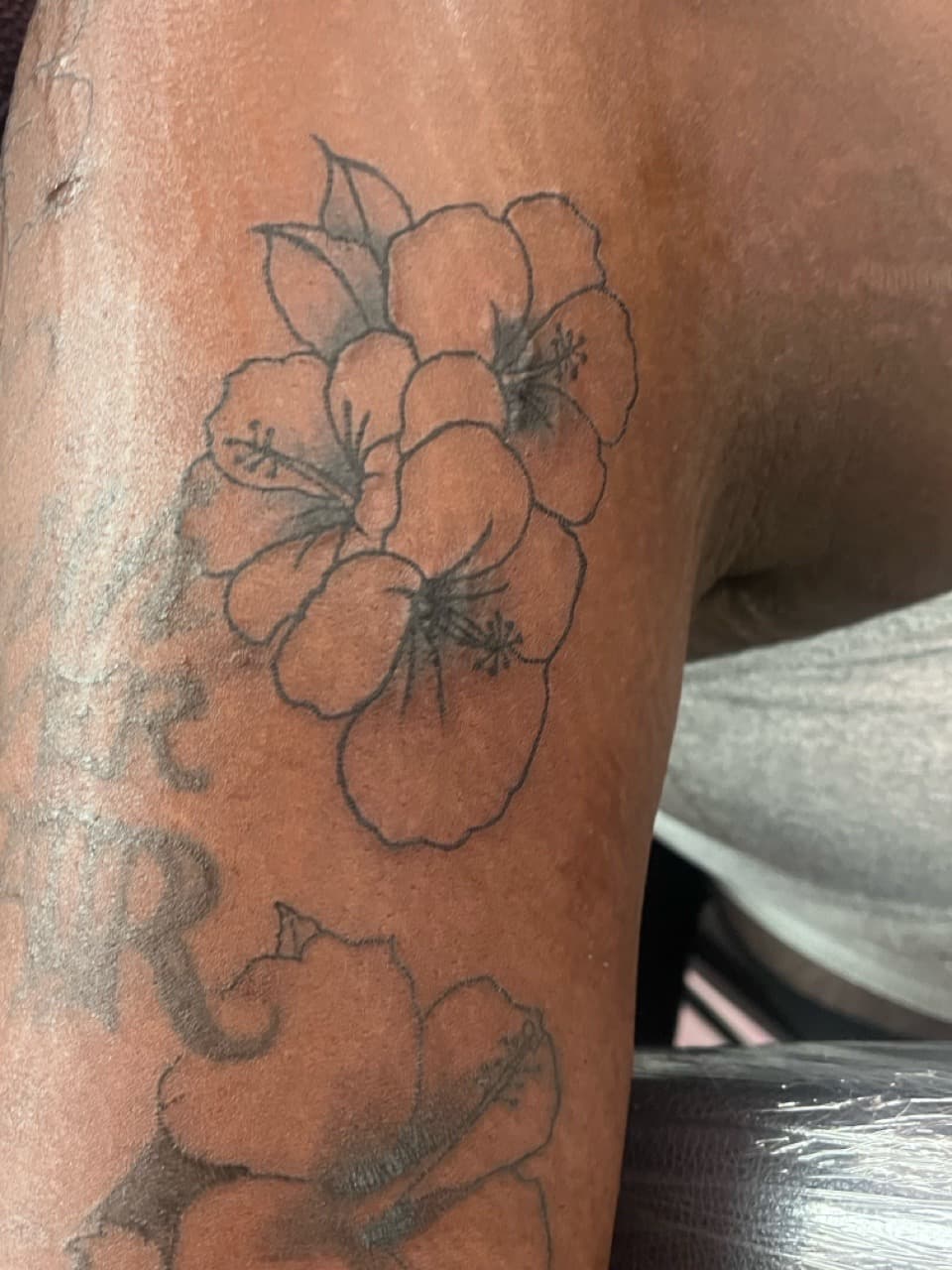 Fine Line + Floral hibiscus tattoo on Upper Arm by prodaJ on TattMe