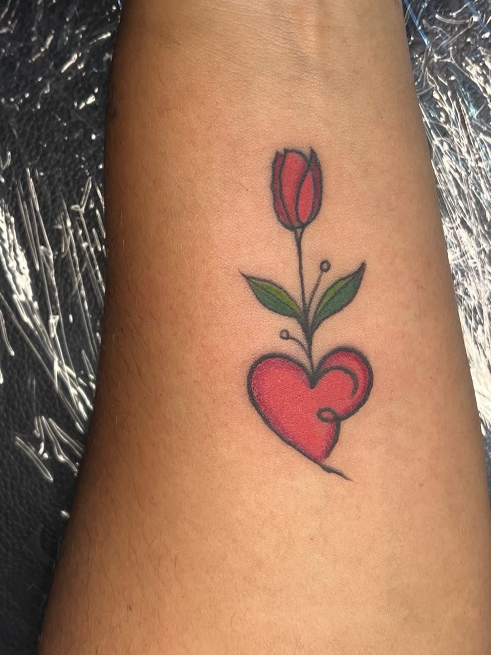 Color + Illustrative tulip tattoo on Forearm by prodaJ on TattMe