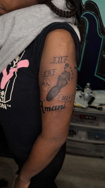 Lettering + Script footprint tattoo on Upper Arm by yeahdatscjink on TattMe