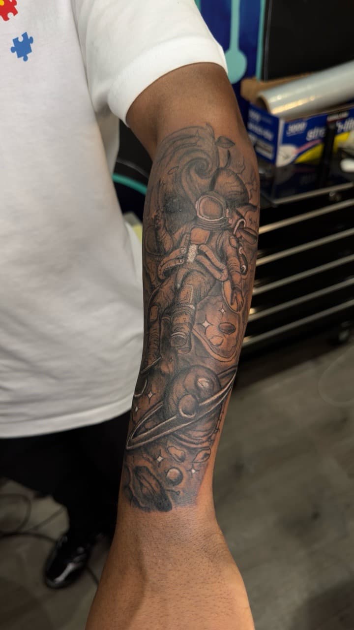 Black & Grey + Illustrative astronaut tattoo on Half Sleeve by yeahdatscjink on TattMe
