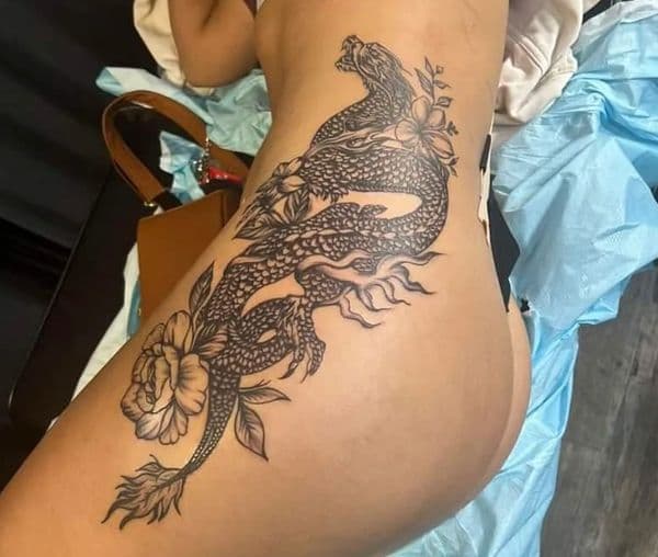 Black & Grey + Illustrative dragon tattoo on Side (Torso) by IndigoInk on TattMe