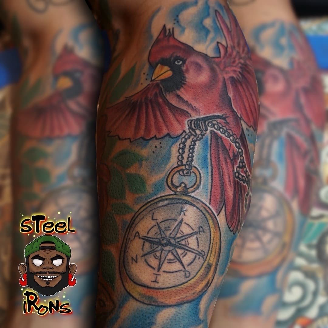 Color + Illustrative cardinal tattoo on Upper Arm by Steelirons on TattMe