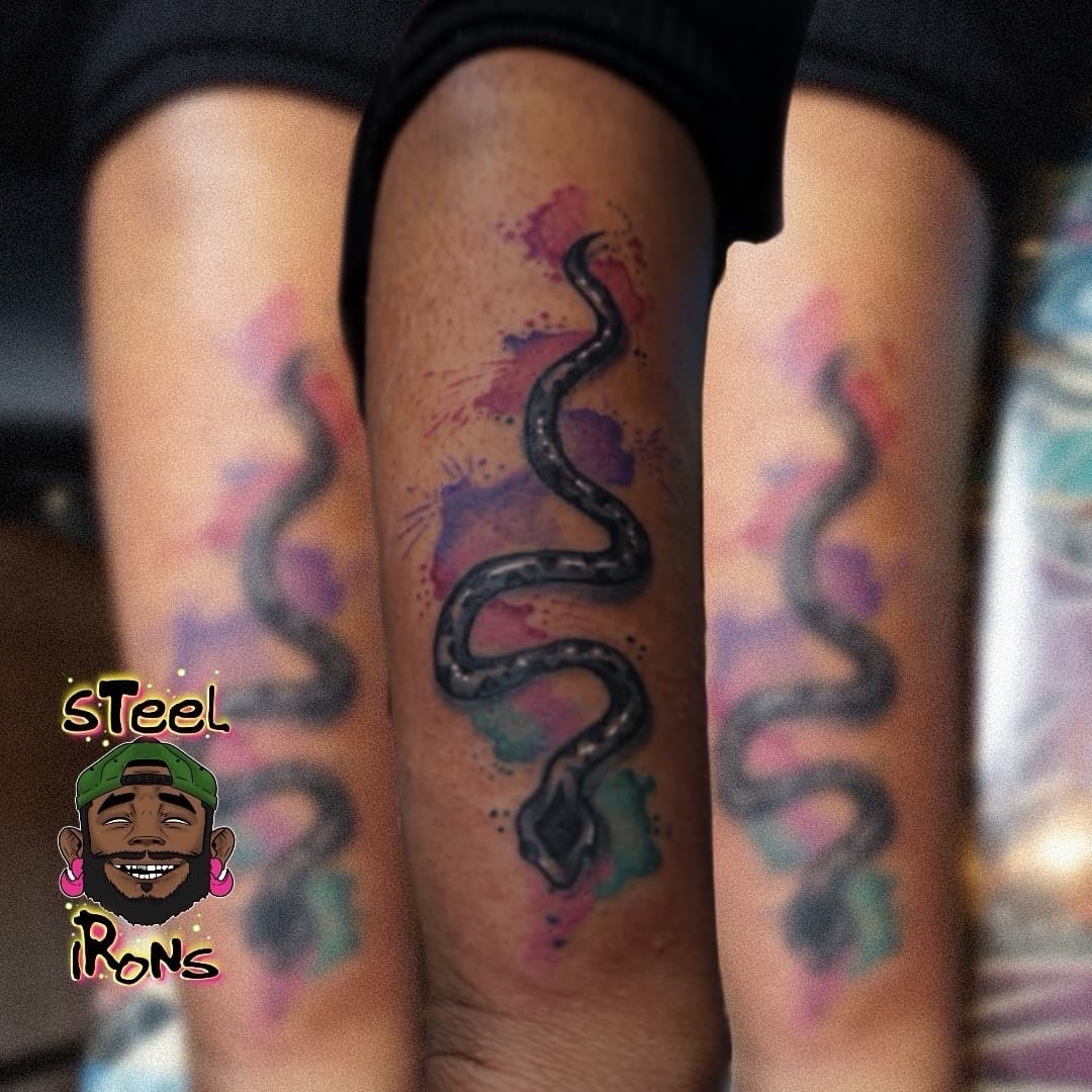 Watercolor + Illustrative snake tattoo on Upper Arm by Steelirons on TattMe